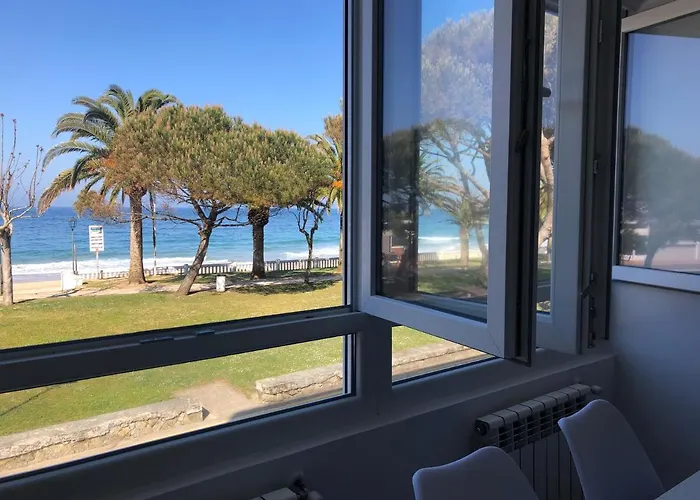 Апартаменты Apartamento Comillas Beach