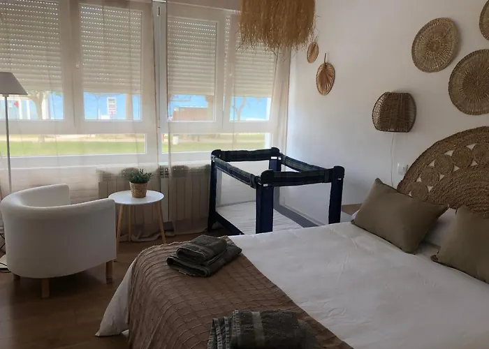 Апартаменты Apartamento Comillas Beach